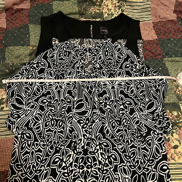 Sleeveless patterned dress with ruffle type top - Picture 9 of 16